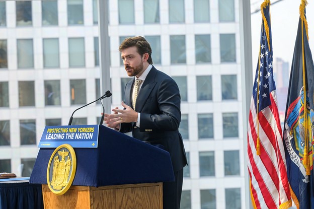 Orange County Partnership President & CEO, Conor Eckert addressing the audience at Governor Hochul's press conference in Brooklyn.